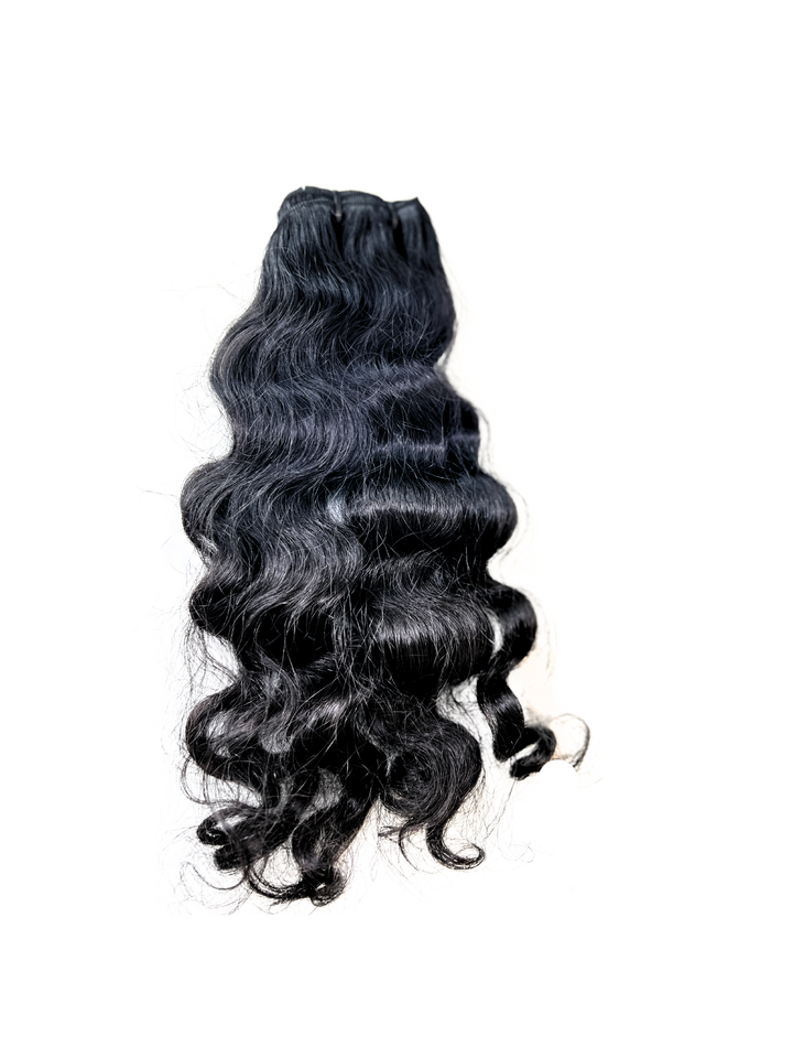  THE CURLY COLLECTION IS truly natural-looking tresses that mimic your natural or relaxed curly hair.  The Curly Collection blends great with your natural or relaxed hair, it can be easily straightened and reverts back to its natural coil after washing.